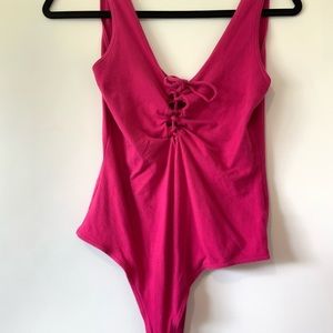 PacSun Pink bodysuit with button bottom